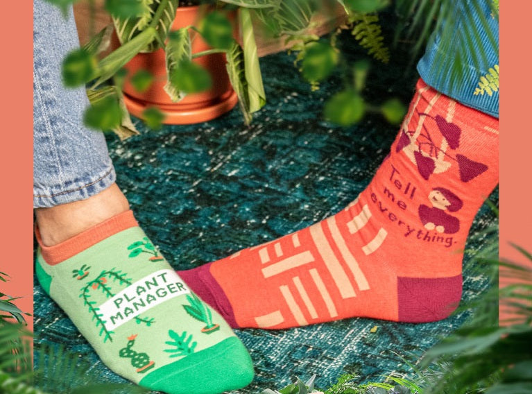 Blue Q Overthinking crew socks styled with a matching pouch
